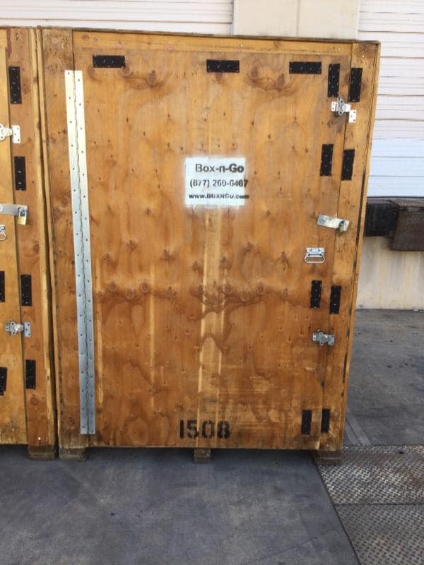 Closed Box-n-Go storage container with branded label, staged for an upcoming storage auction
