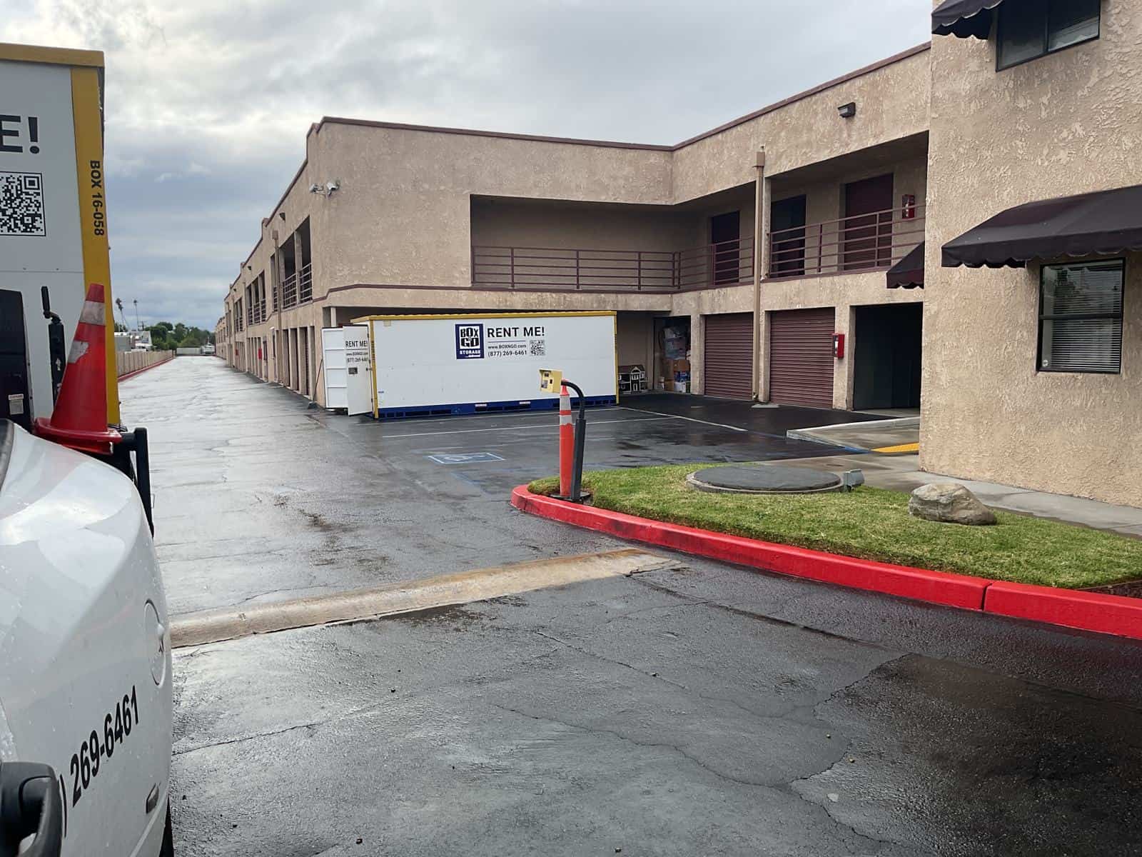 Box-n-Go truck collecting a container for furniture storage during restoration at our Southern California facility