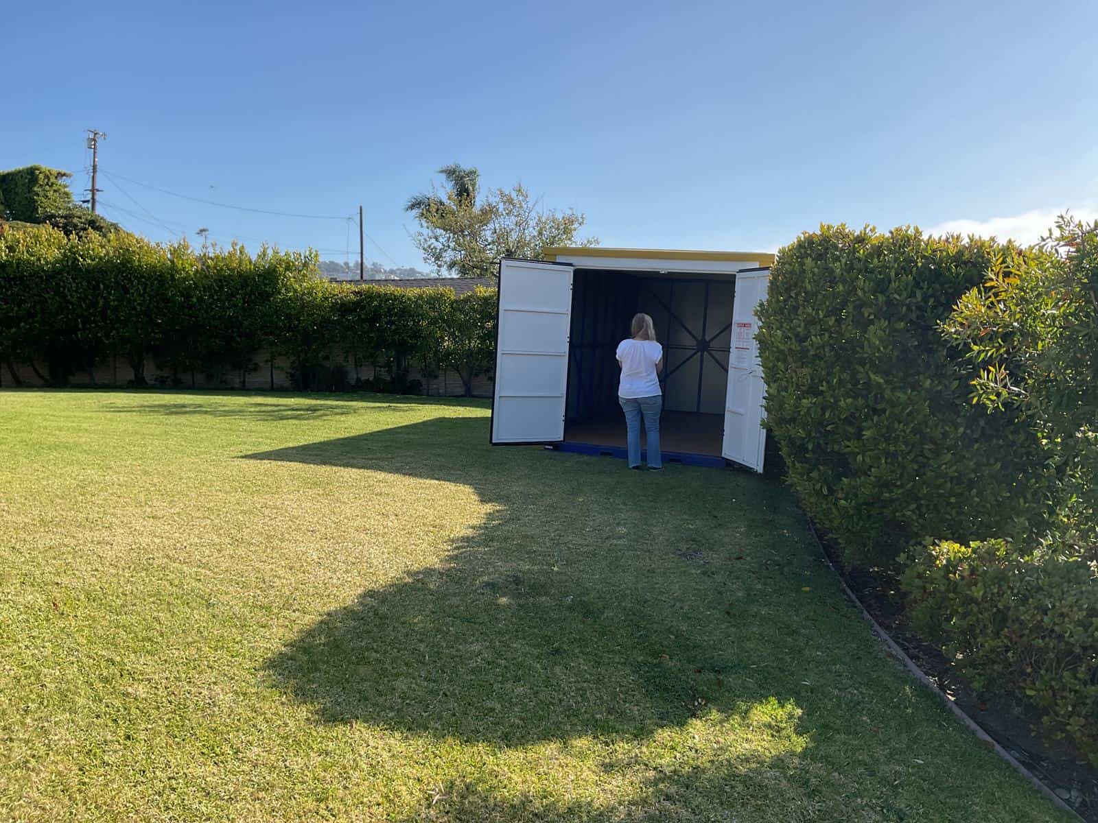 Open Box-n-Go container for storage during water damage repair at a Southern California home