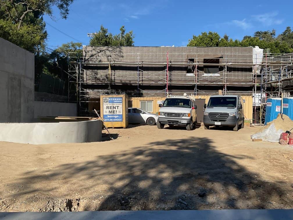 Box-n-Go container used as restoration contractors storage on an active Southern California rebuild site