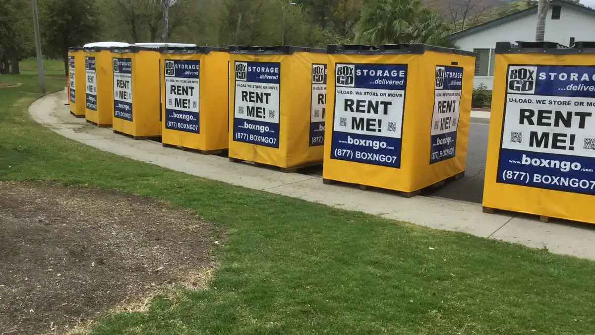 Row of Box-n-Go storage containers staged for student move-out season